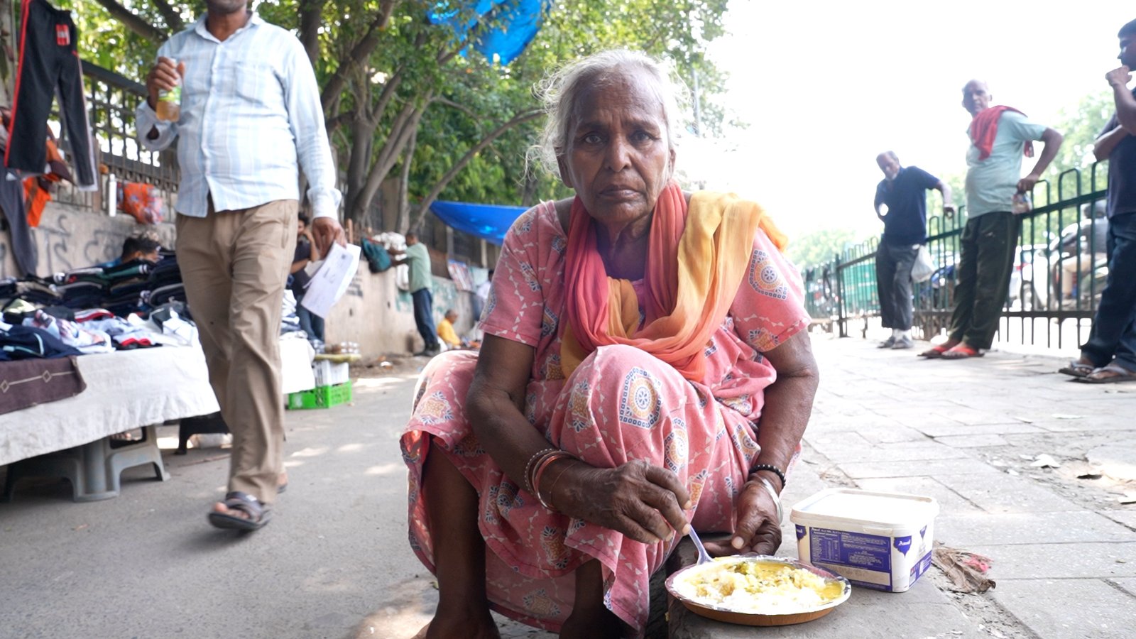 Needy families receiving fresh meals